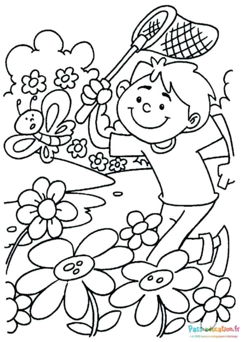 Coloriage Garçon chasse papillon à imprimer et colorier
