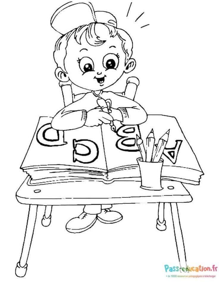 Coloriage Petit écolier studieux à imprimer et colorier