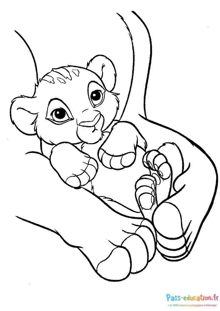 Coloriage Petit lion joueur à imprimer et colorier